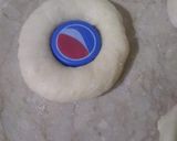 A picture of step 5 of Orange Glaze doughnut.