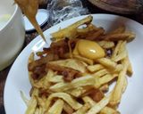 Foto del paso 7 de la receta: Papas con cheddar y crema de verdeo