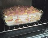 A picture of step 7 of Baked Potatoes with Ham, Cream, and Cheese.
