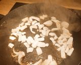 A picture of step 5 of Seafood Paella.