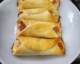Foto del paso 4 de la receta: Pancitos arrollados con jamón