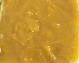 A picture of step 5 of Mango flavoured milk cake in two layers.