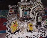 Foto del paso 7 de la receta: Mi casita de jengibre, chocolate y glasé!!🏠🎄🎄🎇