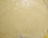 A picture of step 2 of Bread coated with akara paste.