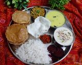 A picture of step 21 of Gujarati Lunch Thali - No onion no garlic.