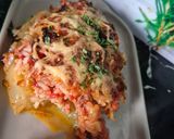 A picture of step 6 of Stuffed Zucchini Gratin in a Dutch Oven.