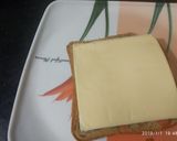 A picture of step 1 of Bread cheesy sandwich with bread khasta jalebi.