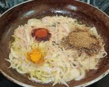 A picture of step 4 of KHAGINA (a savoury egg dish).
