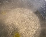 A picture of step 1 of Moghrabieh - semolina dough with chicken.