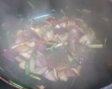 A picture of step 4 of Hong Kong Chicken with light and dark Soy Sauce.