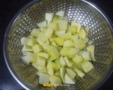 A picture of step 1 of Raw Mango Vaghariyu / Sweet & Sour Mango Pickle.
