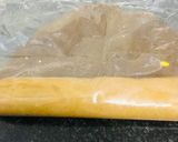 A picture of step 11 of Mary Biscuit Swiss Roll / No Bake Chocolate Roll.