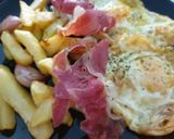 Foto del paso 6 de la receta Huevos rotos con jamón