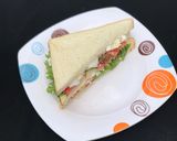 A picture of step 2 of Egg club sandwich.
