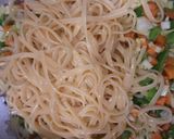 A picture of step 2 of Spaghettis and veg rolls.