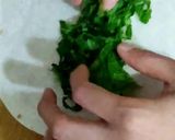 A picture of step 8 of Malai Boti Shawarma Roll.