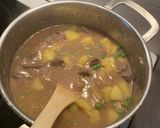 A picture of step 5 of Rice mixed with beef and peas.