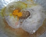 A picture of step 4 of Instant Green chilli pickle.