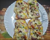 A picture of step 6 of Cream Cheese Bread Pizza.