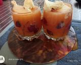 A picture of step 2 of Melon mix fruit cooler.