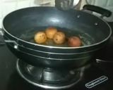 A picture of step 22 of Bread gulab jamun.