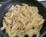 Foto del paso 13 de la receta Macarrones con anchoas, cherry y toque crujiente