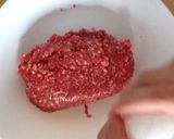A picture of step 1 of Meatball with Tomato Sauce in Pan.