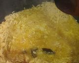 A picture of step 10 of Nigerian fried rice.