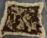Foto del paso 3 de la receta: Pizza de nocilla con fresas y plátano