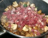 Foto del paso 3 de la receta: Tapa de Portobello con jamón y queso