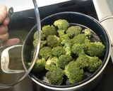 A picture of step 7 of Pork Chops, Broccolli, Rice, and Mushroom Gravy.