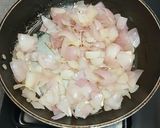 A picture of step 2 of Prawns with coconut and kokum masala curry.