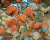 A picture of step 2 of Mustard chicken in carrot and parsnip sauce.