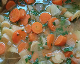 A picture of step 2 of Mustard chicken in carrot and parsnip sauce.