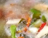 รูปขั้นตอนการทำที่ 5 ของ ต้มกะทิไก่ใส่ฟัก