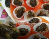 A picture of step 2 of Chocolate and Fresh Cream stuffed Dates.