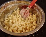 A picture of step 5 of Individual Creamy Macaroni and Cheese Bites.