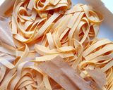 A picture of step 3 of Chicken fettuccine pasta in white sauce.
