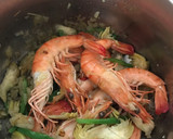 Foto del paso 4 de la receta: Arroz caldoso con marisco 🍤 y verduras