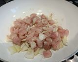 A picture of step 3 of Hairy Bikers All-In-One Spicy Pork and Rice.