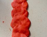 A picture of step 7 of Marie biscuit flowers 🌹.