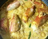 A picture of step 4 of Chingri Macher Malai Curry and doodh pulao.