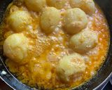 A picture of step 11 of Bhetki Mach’r Kochuri o Doi Alu Dum Thakurbarir style.