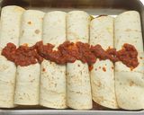 A picture of step 12 of Curry chicken enchiladas (includes overnight marinading).