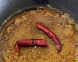A picture of step 1 of Kadai Chicken.