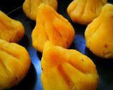 A picture of step 29 of Puran poli modak.