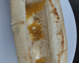 Foto del paso 6 de la receta: Perrito caliente🌭con aguacate🥑🧀y salsa tártara🥯