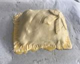 A picture of step 9 of Beef wellington.