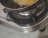 A picture of step 10 of Luchi and Cholar Dal.