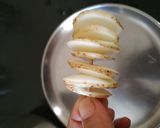 A picture of step 5 of Peri peri potato twist.